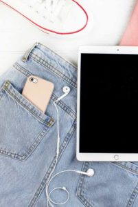 iPad with jeans and iPhone in pocket